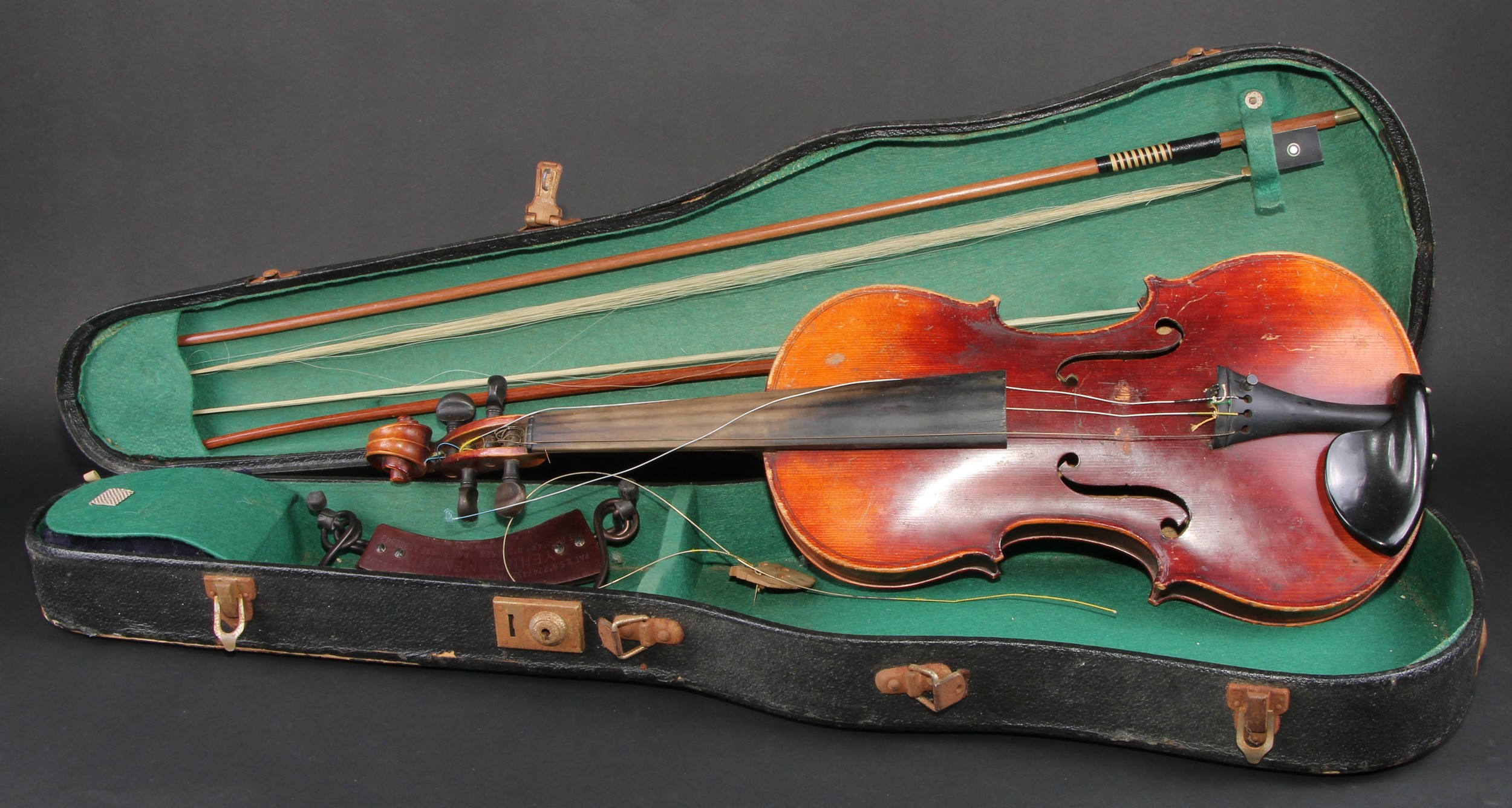 A violin, by Neuner & Hornsteiner, Mittenwald in Bayern, paper label, the two-piece back 36cm long excluding button, ebony tuning pegs, outlined throughout with purfling, 60.5cm long overall, the bows unsigned, 34cm long, cased