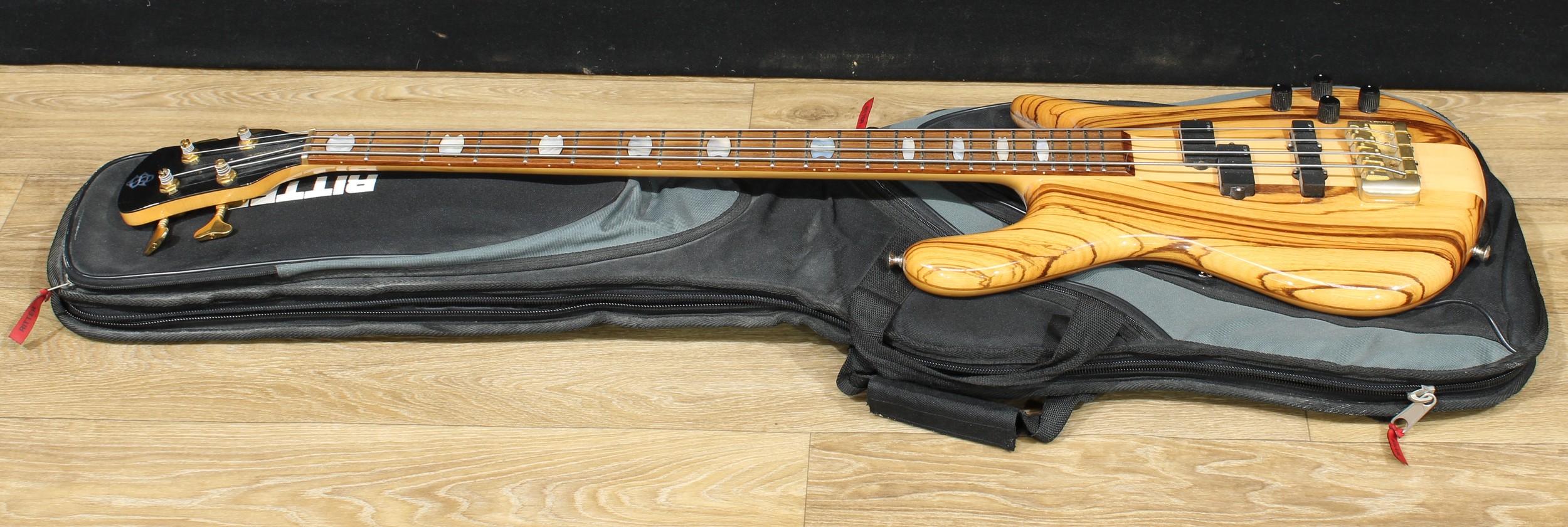 A Spector electric guitar, indistinctly numbered, 113cm long, cased